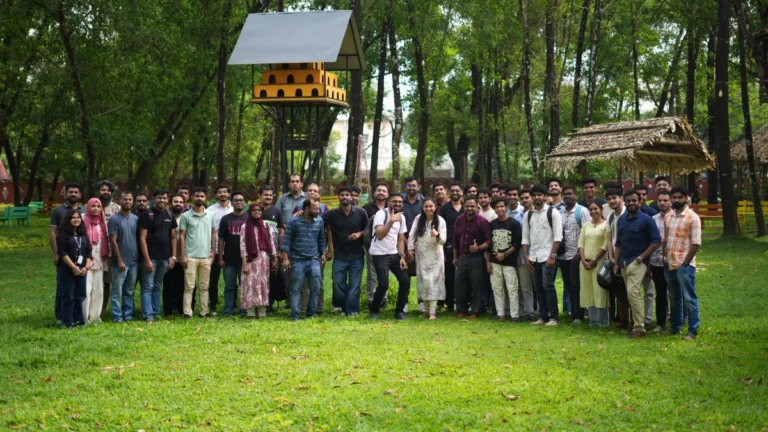 Group photo of attendees at the CNCF and AWS Kochi November meetup standing outdoors